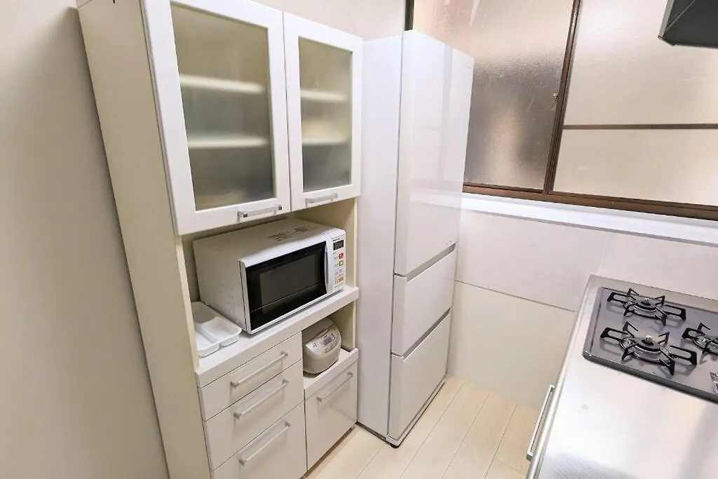Apartment Jr西九条徒歩4分！最大12名宿泊可能！貸切一軒家！Usj、梅田アクセス良好！１f広々リビングあり！ Osaka Japan